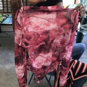 Pink and black body suit